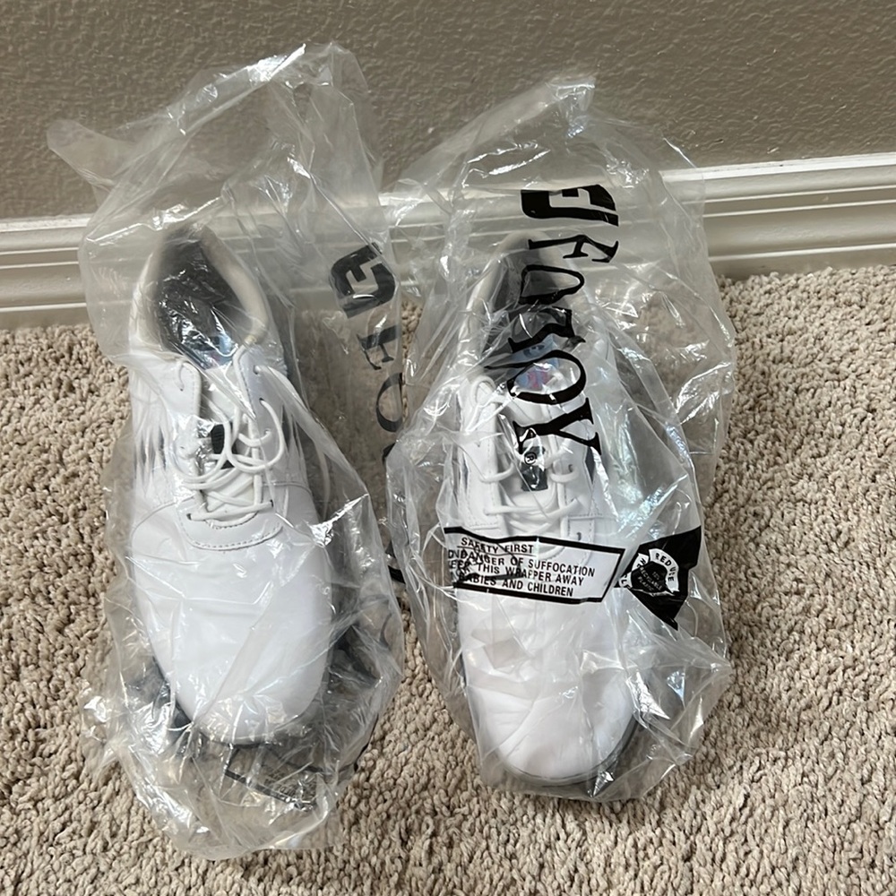 Footjoy woman’s gold shoes